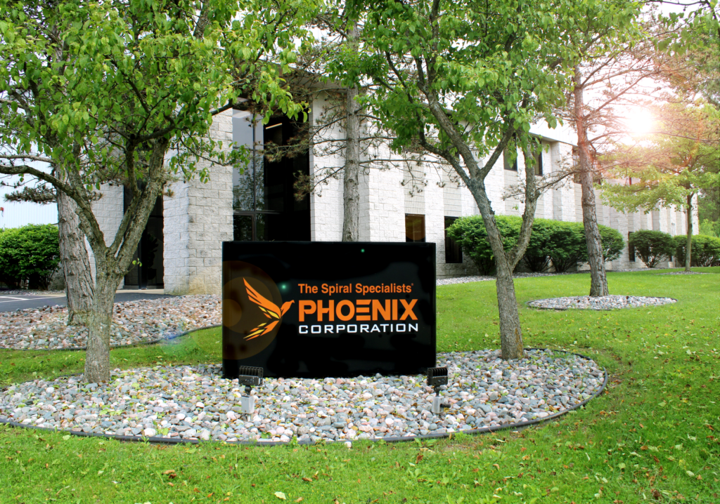 Phoenix Corporation headquarters, with a sign of the phoenix corporation logo 